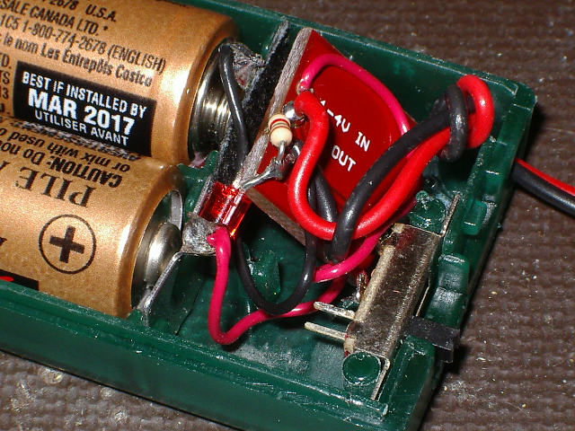 Closeup of switch and booster PCB