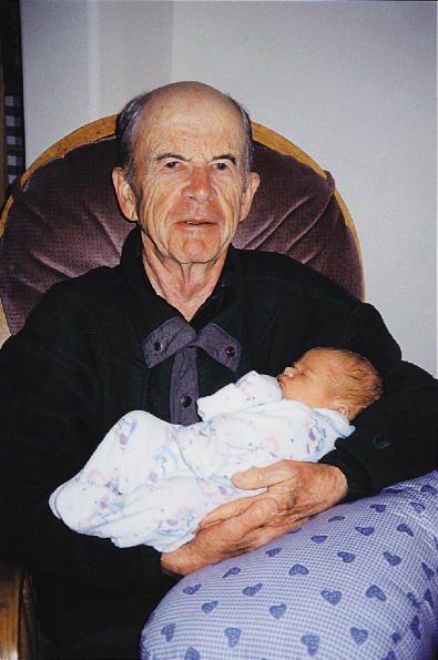 Dad 'hard at work' with his newest grandchild, Kaitlyn